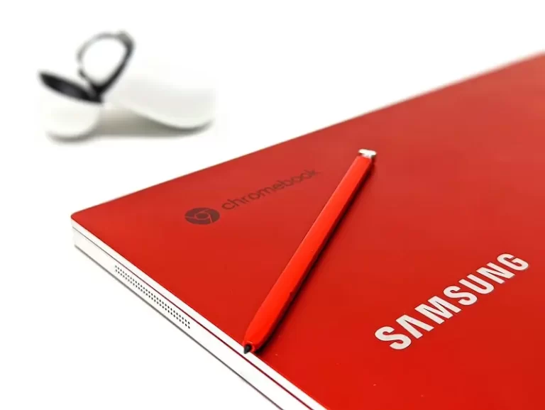 Image of a red S pen on the back of red Samsung Tabler